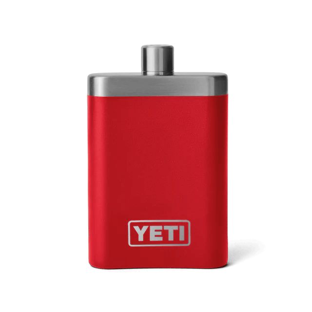Vibrant red YETI flask showcasing a rugged design with a stainless steel cap.
