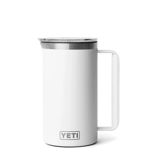 A white YETI mug with a wide stainless steel bottom, blender for coffee lovers.