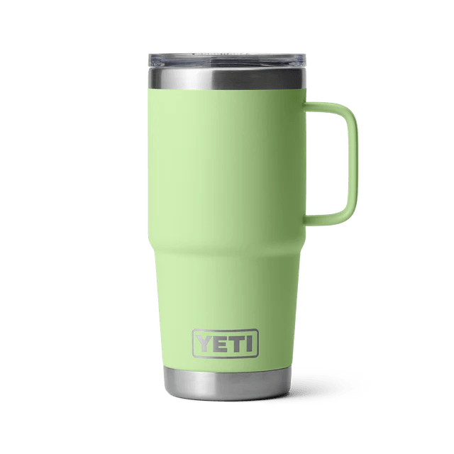 Vibrant green 20 oz YETI Rambler travel mug showcasing a sleek design and ergonomic handle for easy carrying.