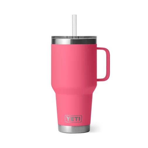 Customizable YETI Rambler 35 oz Straw Mug in vibrant pink color featuring a stainless steel straw and a comfortable handle.